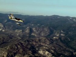 AIR TO AIR, WS, Two Aero L-39 Albatroses flying over Mojave Desert hills, California, USA Stock Footage