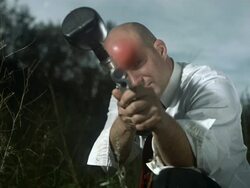 HD Super Slow-Mo: Businessman Aiming Into The Camera Stock Footage