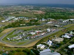 WS AERIAL View of Kyalami Race Track and surrounding landscape / Midrand, Gauteng, South Africa Stock Footage