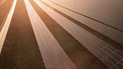 AERIAL Solar Power Station At Sunset Flyover Shot Stock Footage