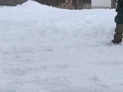 HD: Cleaning road with snow shovel Stock Footage