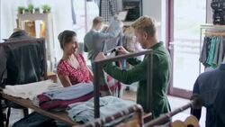 Young couple shop in local clothing store Stock Footage