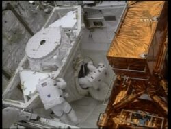First of 5 spacewalks to repair Hubble, install huge new camera News Clip