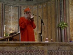 WS ZO Man blowing into shell horn in Saint Bartholomew's Espiscopal church / New York City, New York, USA Stock Footage