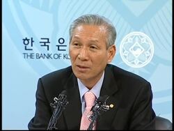 Markets, Seoul cuts rates, Development Bank, AIG chief News Clip