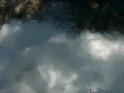 Cascading water detail on Merced River, looking downstream in Yosemite National Park, California Stock Footage