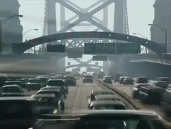 Time lapse multiple lanes of commuter traffic congestion drive toward and away from camera on the Ben Franklin Bridge. Stock Footage