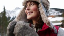 Close up woman warm clothing drinking hot coffee Stock Footage