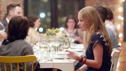 MS Two female friends in discussion during dinner party Stock Footage