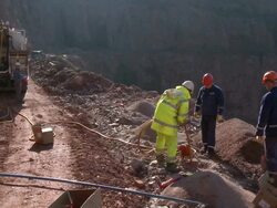 MS Worker preparing blasting operation at quarry / Taben-Rodt, Rhineland-Palatinate, Germany Stock Footage