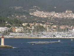 WS View of lighthouse with harbour / Mallorca, Balearic Islands, Spain Stock Footage
