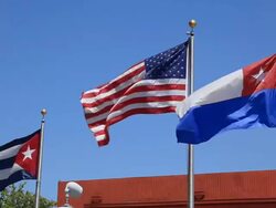 US and Cuban Flags Stock Footage