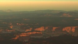 Sunlight glows on the cliffs of the Grand Canyon. Stock Footage
