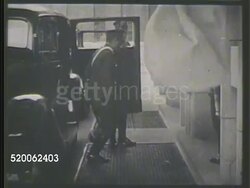 1930s: JAPAN: STATE HEARING: WS Japanese soldier opening door to car pulling up, officer getting out. INT MS Banners w/ sun disc (from Japanese flag). BRIEF MS Prime Minister Hideki Tojo (1884-1948) standing in state room. VS Japanese statesmen. Instructional Video