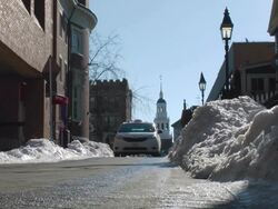MS Shot of car and person passing down city street / Boston, Massachusetts, United States Stock Footage
