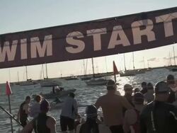 WS ZI triathletes waiting for swim start / Chicago, Illinois, USA Stock Footage