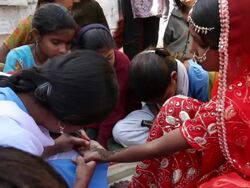 MS Young Indian bride getting henna tatt / Rajasthan, India Stock Footage