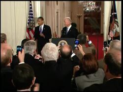 US President Barack Obama signs healthcare bill into law News Clip