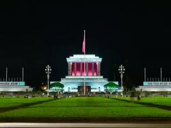 MS T/L ZO View of Ho Chi Minh's Mausoleum building at nightfall with grass / Hanoi, Vietnam Stock Footage