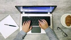 Businesswoman using laptop Stock Footage
