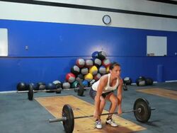 female clean and jerk exercise-side shot Stock Footage