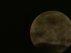 MS Full moon partially covered in clouds / Florida Keys, Florida, USA Stock Footage