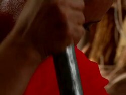 Woman's face pouding roasted coffee grains for coffee ceremony Stock Footage