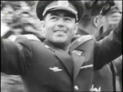 Soviet cosmonauts Andrian Nikolayev and Pavel Popovich wave from their motorcade during a parade through Red Square, Moscow, Russia. News Clip