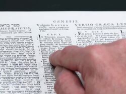 HD Reading Genesis 1 Close-up (Rack Focus) (4:2:2) Stock Footage