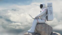 Astronaut Sitting On A Rock And Working With Computer Stock Footage