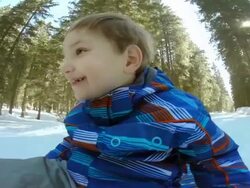 Boy On A Sled Stock Footage