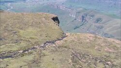over the top of teluga falls - Aerial View - KwaZulu-Natal,  uThukela District Municipality,  Okhahlamba,  South Africa Stock Footage
