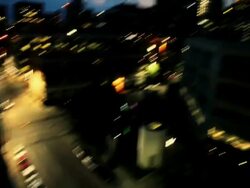 Nighttime Pan of Calgary Skyline, Shot Handheld News Style Stock Footage