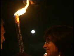 Vigil for quake victims and against summit more News Clip