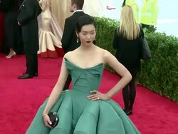 Liu Wen at 'Charles James: Beyond Fashion' Costume Institute Gala - Arrivals Stock Footage