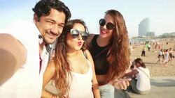 Friends taking a selfie at Barceloneta Stock Footage