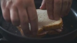 Preaparing and Roasting Bacon Sandwich Stock Footage