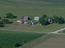 Farm house with a red barn Stock Footage