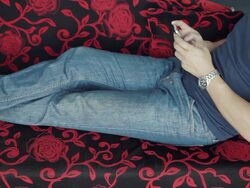 Asian male relax on sofa with smartphone Stock Footage