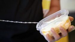 preparing mango  slices with  cream layers Stock Footage