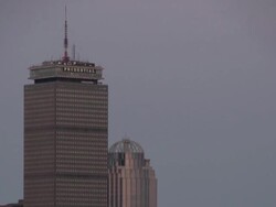 Full Moon rises over Boston Downtown at dusk. TL day to night Stock Footage