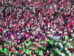 Elevated view over a crowd outside in Seoul Plaza (Gwangjang), Seoul, Korea Stock Footage