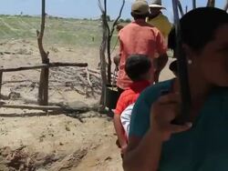 MS TS Shot of Family collecting water from shafts / Pilao Arcado, Bahia, Brazil Stock Footage