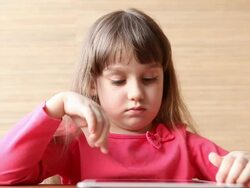 Digital Tablet and Girl (HD) Stock Footage