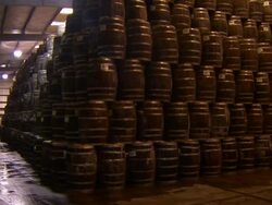 Pan of stacks of barrels of tabasco. Stock Footage