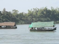 WS boats on river / Tha Ngon, Laos Stock Footage