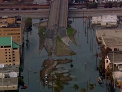 Aerial over flooded street and elevated roadway in the Gentilly neighborhood / New Orleans, Louisiana Stock Footage