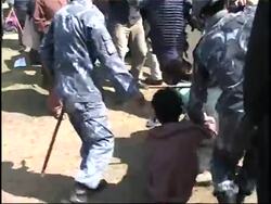 Police arresting Tibetan refugees at demo News Clip