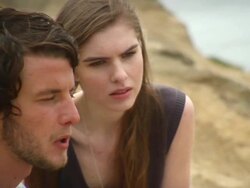 CU PAN Couple sitting on cliff / Cape Kiwanda, Oregon, USA Stock Footage