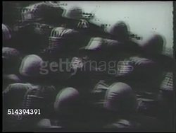 1942: ALEUTIAN ISLAND CAMPAIGN: IMPERIAL JAPANESE ARMY: VS Japanese soldiers mobilizing, riding landing crafts, walking across Kiska Island fields w/ I.J.A. war flag, army saluting war flag (Rising Sun Flag). WWII, Alaska, occupation Kiska. Instructional Video